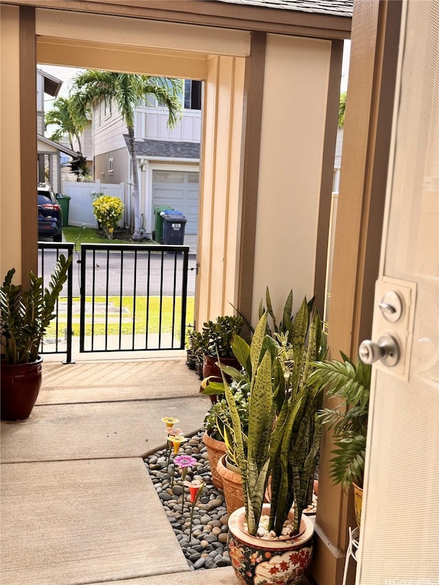 91-1200 Keaunui Dr Unit 309, Ewa Beach, HI 96706 - doorway to property featuring stucco siding