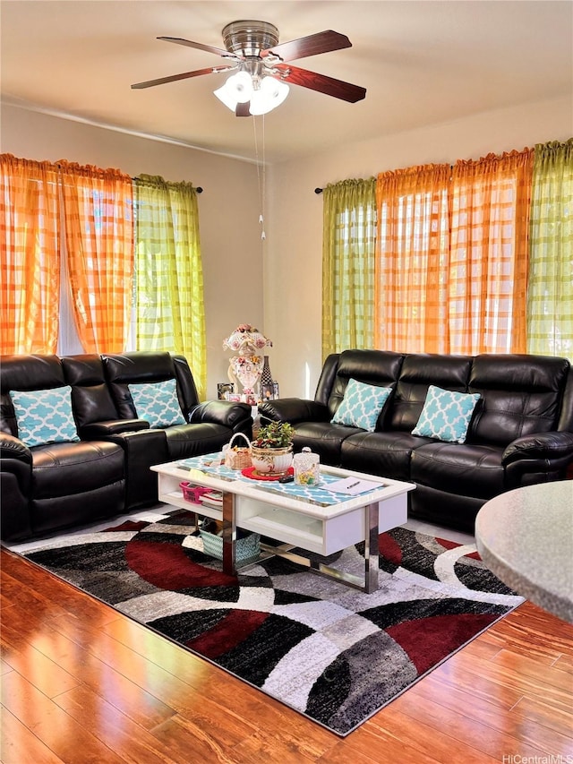 91-1200 Keaunui Dr Unit 309, Ewa Beach, HI 96706 - living area with wood finished floors and ceiling fan