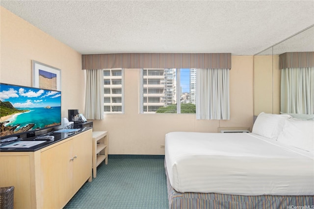 444 Kanekapolei St Unit 513, Honolulu, HI 96815 - carpeted bedroom featuring a textured ceiling