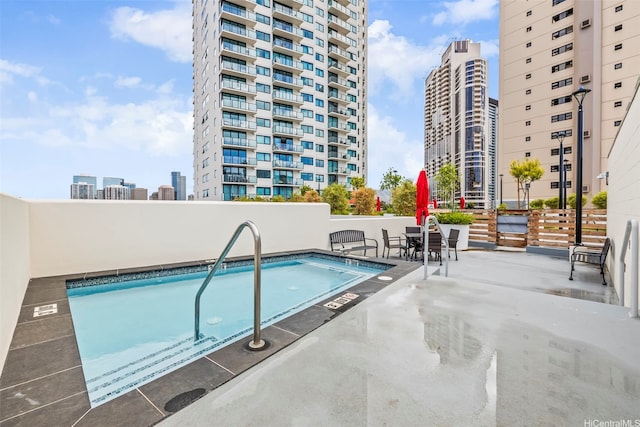 615 Keawe St Unit 3005, Honolulu, HI 96813 - community pool with a view of city and a patio area