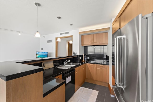 1330 Ala Moana Blvd Unit 3305, Honolulu, HI 96814 - kitchen with high end refrigerator, dishwasher, dark countertops, and dark tile patterned flooring