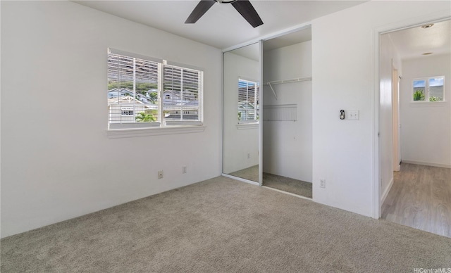 87-1106 Oheohe St, Waianae, HI 96792 - unfurnished bedroom featuring carpet, a closet, and a ceiling fan