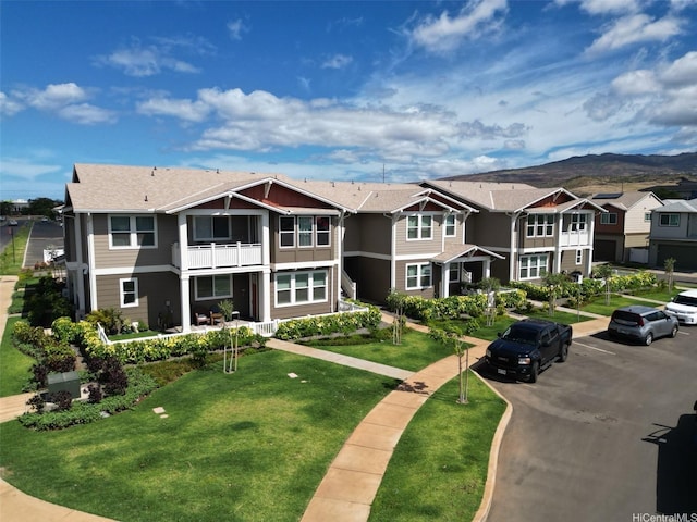 91-1101 Franklin D Roosevelt Ave Unit 365, Kapolei, HI 96707 - surrounding community featuring a residential view, a mountain view, uncovered parking, and a yard