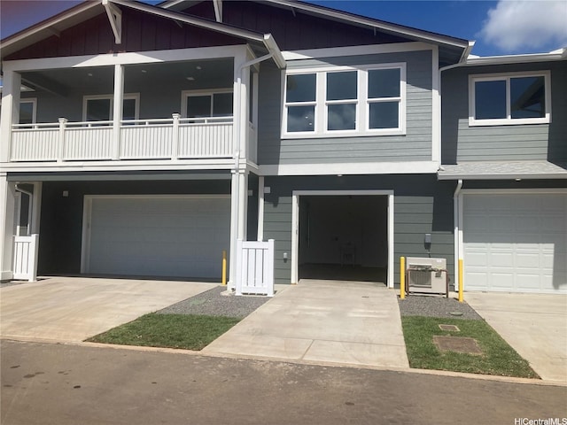 91-1101 Franklin D Roosevelt Ave Unit 365, Kapolei, HI 96707 - view of front of house featuring an attached garage, driveway, and a balcony
