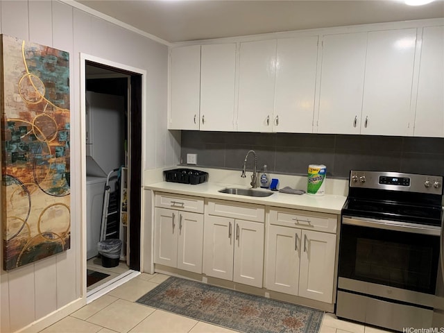 410 Nahua St Unit 204, Honolulu, HI 96815 - kitchen featuring stainless steel electric stove, light countertops, and white cabinets