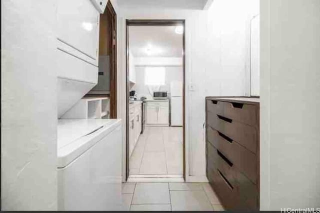 410 Nahua St Unit 204, Honolulu, HI 96815 - laundry room with light tile patterned floors