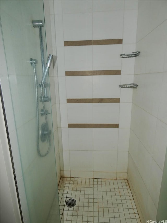 1177 Queen St Unit 3405, Honolulu, HI 96814 - bathroom featuring a stall shower and tile patterned flooring