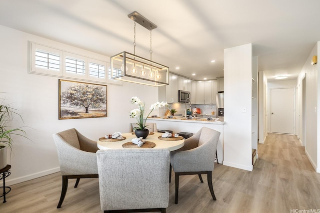 91-497 Kuhialoko St, Ewa Beach, HI 96706 - dining space with light wood-type flooring and recessed lighting