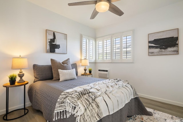 91-497 Kuhialoko St, Ewa Beach, HI 96706 - bedroom featuring wood finished floors, ceiling fan, and an AC wall unit
