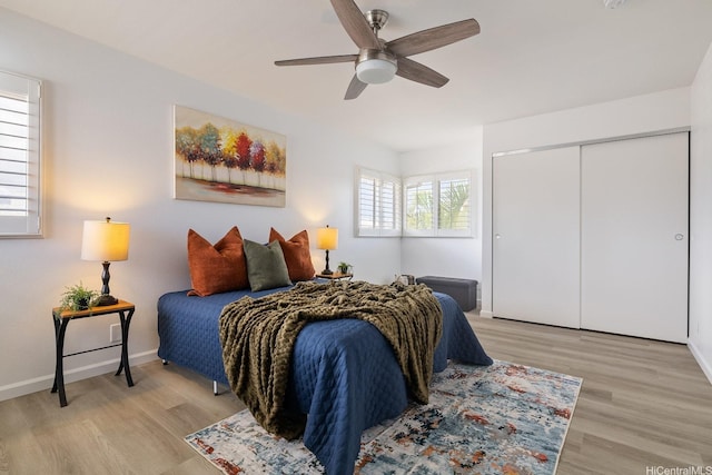 91-497 Kuhialoko St, Ewa Beach, HI 96706 - bedroom with light wood-style floors, a closet, and a ceiling fan