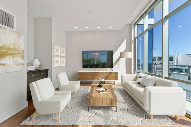 1189 Waimanu St Unit 4301, Honolulu, HI 96814 - living area featuring wood finished floors and recessed lighting