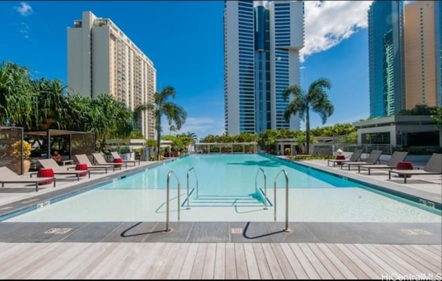 1189 Waimanu St Unit 4301, Honolulu, HI 96814 - community pool featuring a patio area
