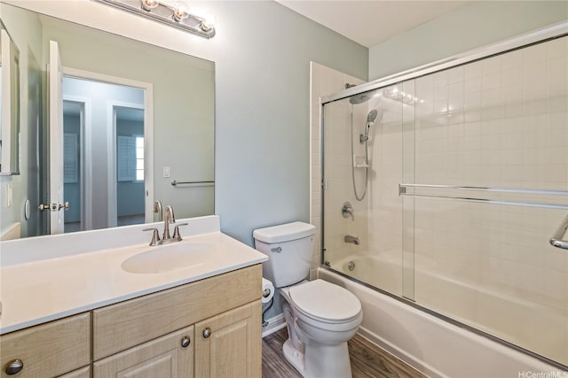 91-324 Kailike Pl, Ewa Beach, HI 96706 - full bathroom featuring vanity, combined bath / shower with glass door, and wood finished floors