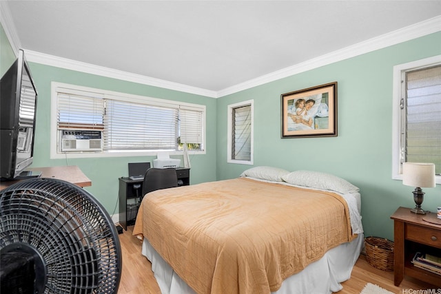 356 Opihikao Pl Unit 542, Honolulu, HI 96825 - bedroom featuring light wood-type flooring and crown molding