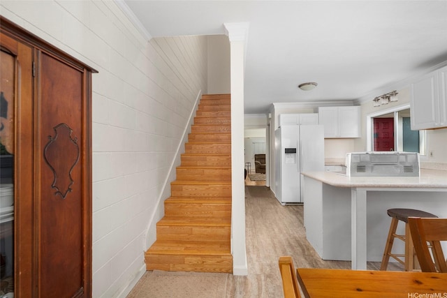 356 Opihikao Pl Unit 542, Honolulu, HI 96825 - stairway featuring crown molding