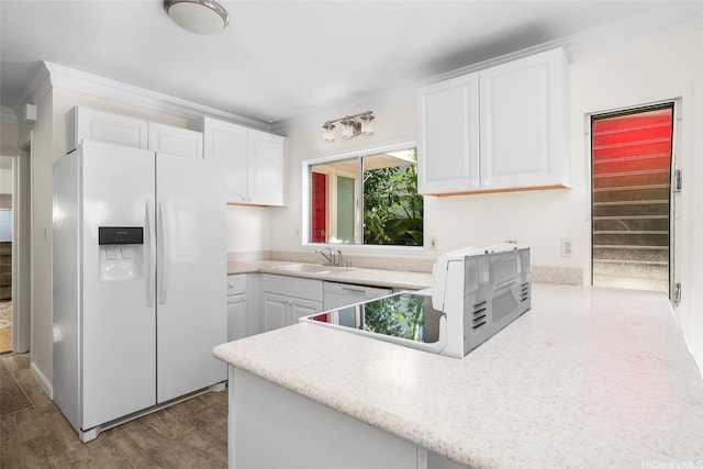 356 Opihikao Pl Unit 542, Honolulu, HI 96825 - kitchen featuring ornamental molding, white refrigerator with ice dispenser, white cabinets, a peninsula, and light countertops