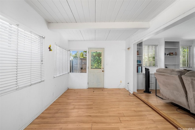 356 Opihikao Pl Unit 542, Honolulu, HI 96825 - sunroom with beamed ceiling and healthy amount of natural light