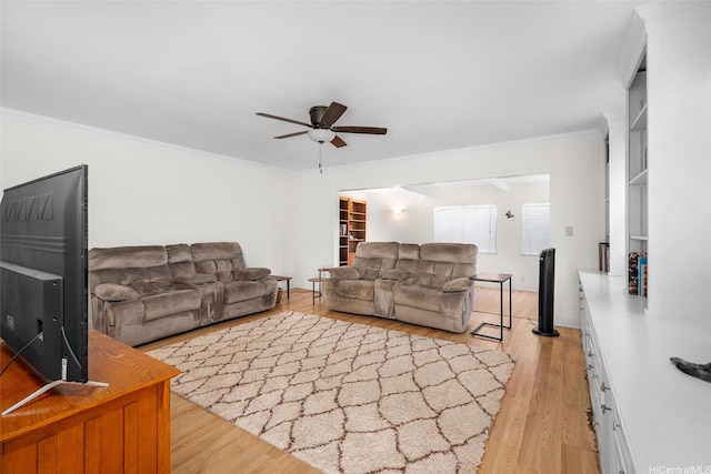 356 Opihikao Pl Unit 542, Honolulu, HI 96825 - living room featuring ceiling fan, crown molding, and light wood-style flooring