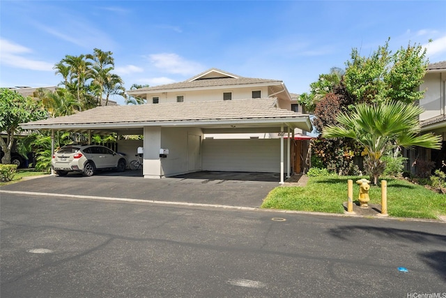 356 Opihikao Pl Unit 542, Honolulu, HI 96825 - traditional home featuring covered parking and a tiled roof