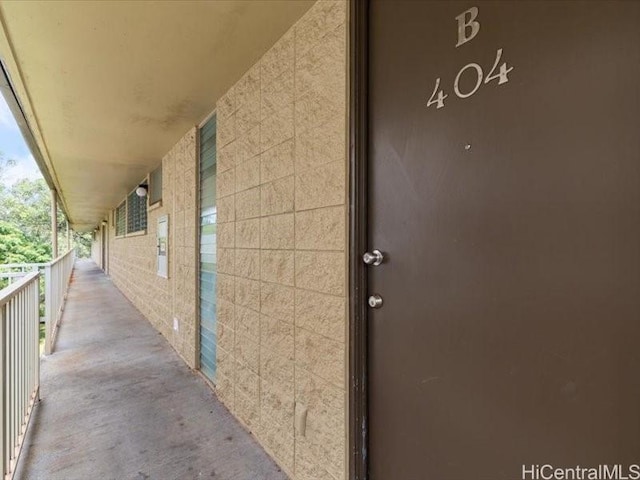 95-2055 Waikalani Pl Unit B404, Mililani, HI 96789 - view of exterior entry with a balcony