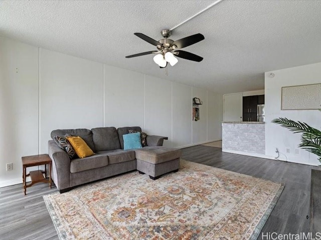 95-2055 Waikalani Pl Unit B404, Mililani, HI 96789 - living area with wood finished floors, a ceiling fan, and a textured ceiling