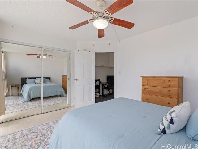 95-2055 Waikalani Pl Unit B404, Mililani, HI 96789 - carpeted bedroom featuring a closet and ceiling fan