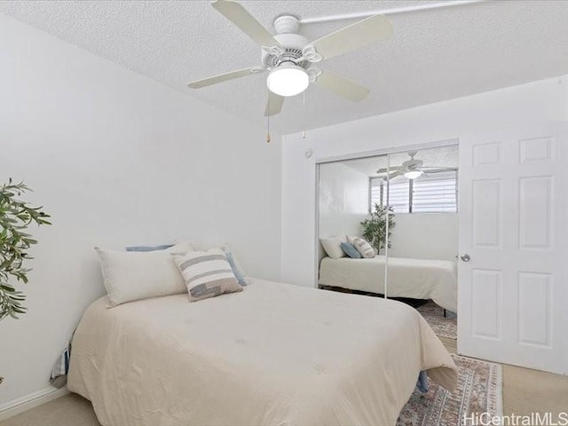 95-2055 Waikalani Pl Unit B404, Mililani, HI 96789 - bedroom featuring light colored carpet, a closet, and a ceiling fan