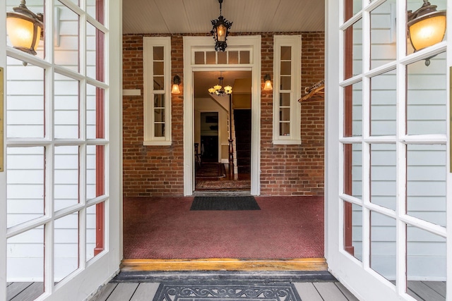 doorway to property with a porch