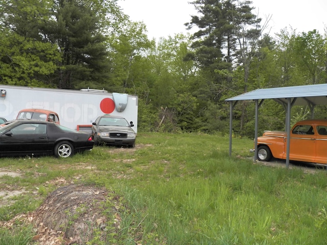 view of yard with a carport