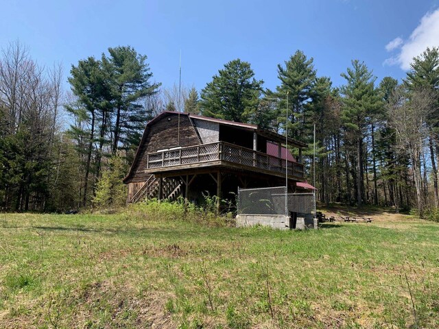 275 Mica Mine Rd, Unity, NH 03743 - rear view of property with a lawn and a deck