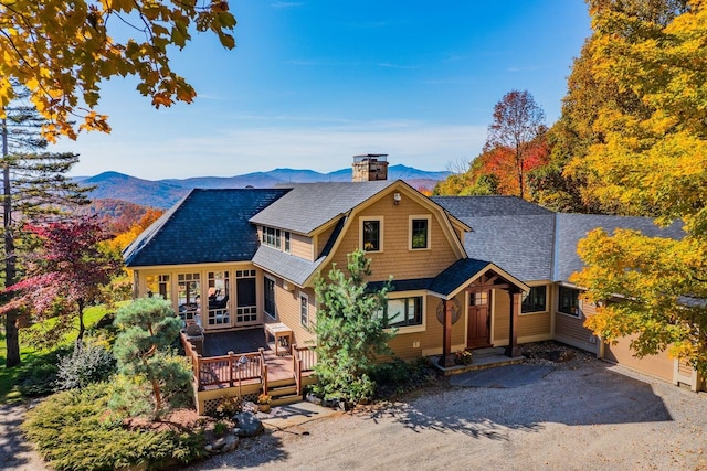 view of front of home with a mountain view