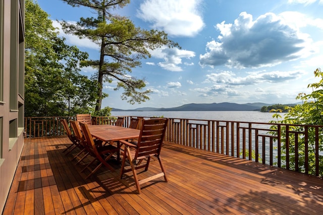 deck featuring a water and mountain view