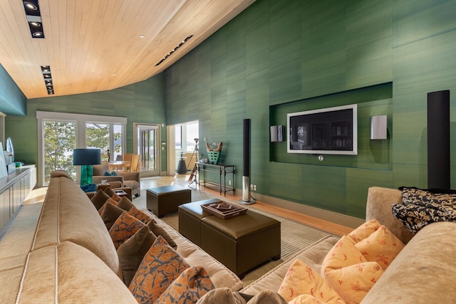 living room featuring high vaulted ceiling and wood ceiling