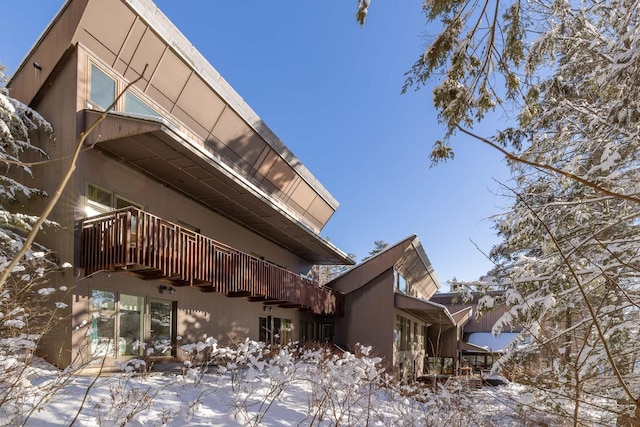 view of snow covered property