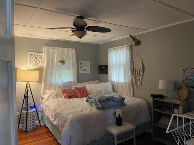 bedroom featuring ceiling fan and hardwood / wood-style floors