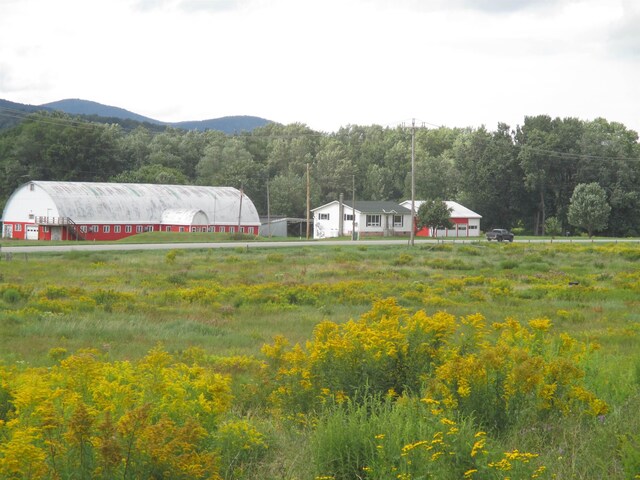 surrounding community featuring a mountain view