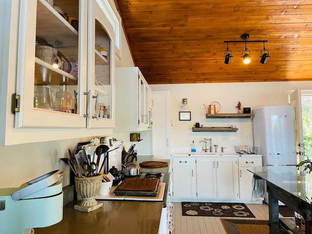 43 Jackson Lodge Rd, Canaan, VT 05903 - kitchen featuring wooden ceiling, lofted ceiling, white cabinetry, and sink