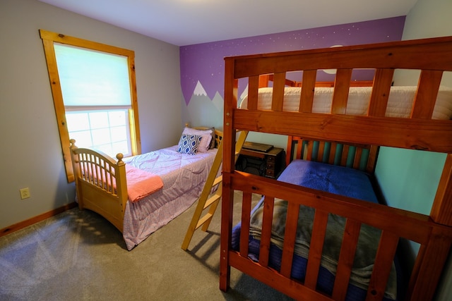 carpeted bedroom with baseboards