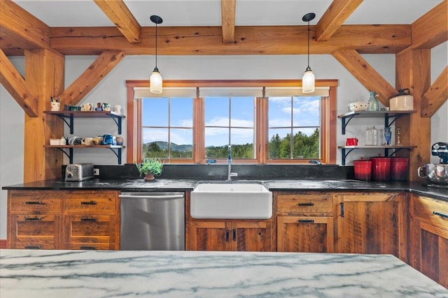 kitchen featuring a wealth of natural light, hanging light fixtures, dishwasher, and sink