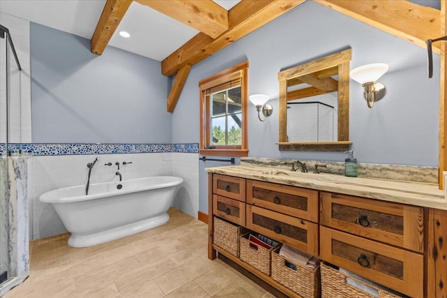 bathroom with tile walls, tile floors, vanity, and beamed ceiling