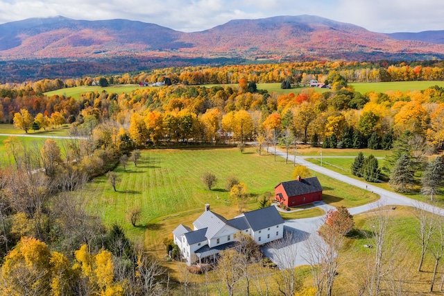 aerial view with a mountain view and a rural view