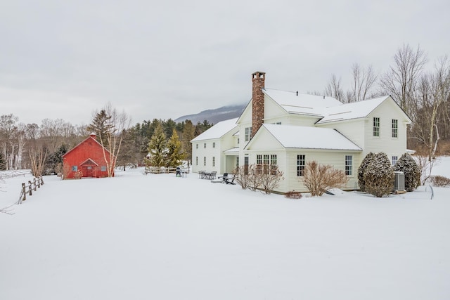 view of snow covered property