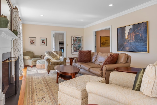 living room featuring crown molding and hardwood / wood-style flooring