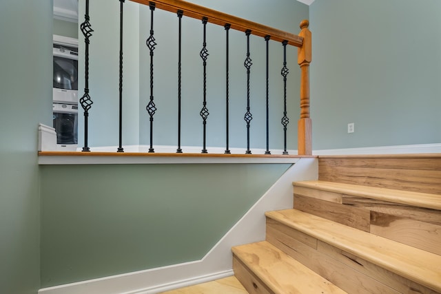 stairway with light tile floors