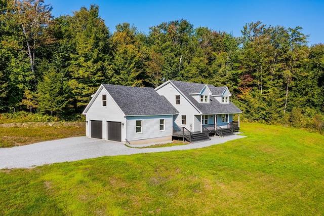 view of front of property with a front yard and a deck