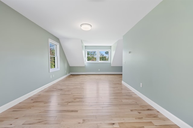 empty room with light hardwood / wood-style flooring