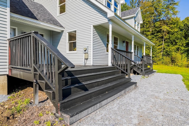 property entrance featuring covered porch