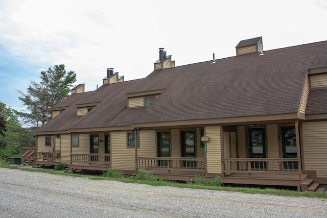 back of house with a porch