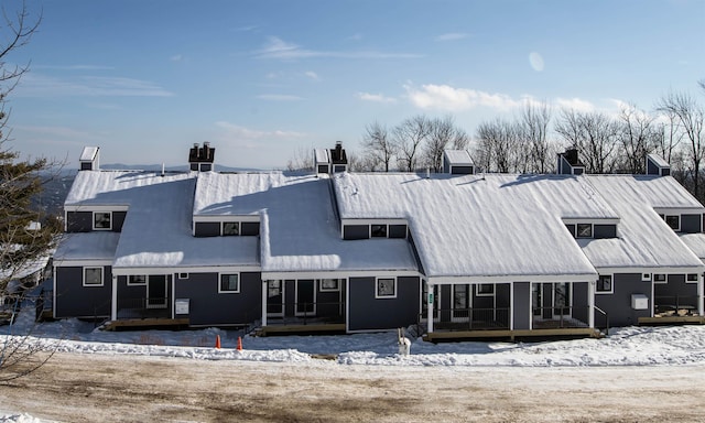 view of snow covered property