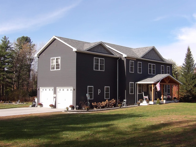 exterior space featuring a front yard and a garage